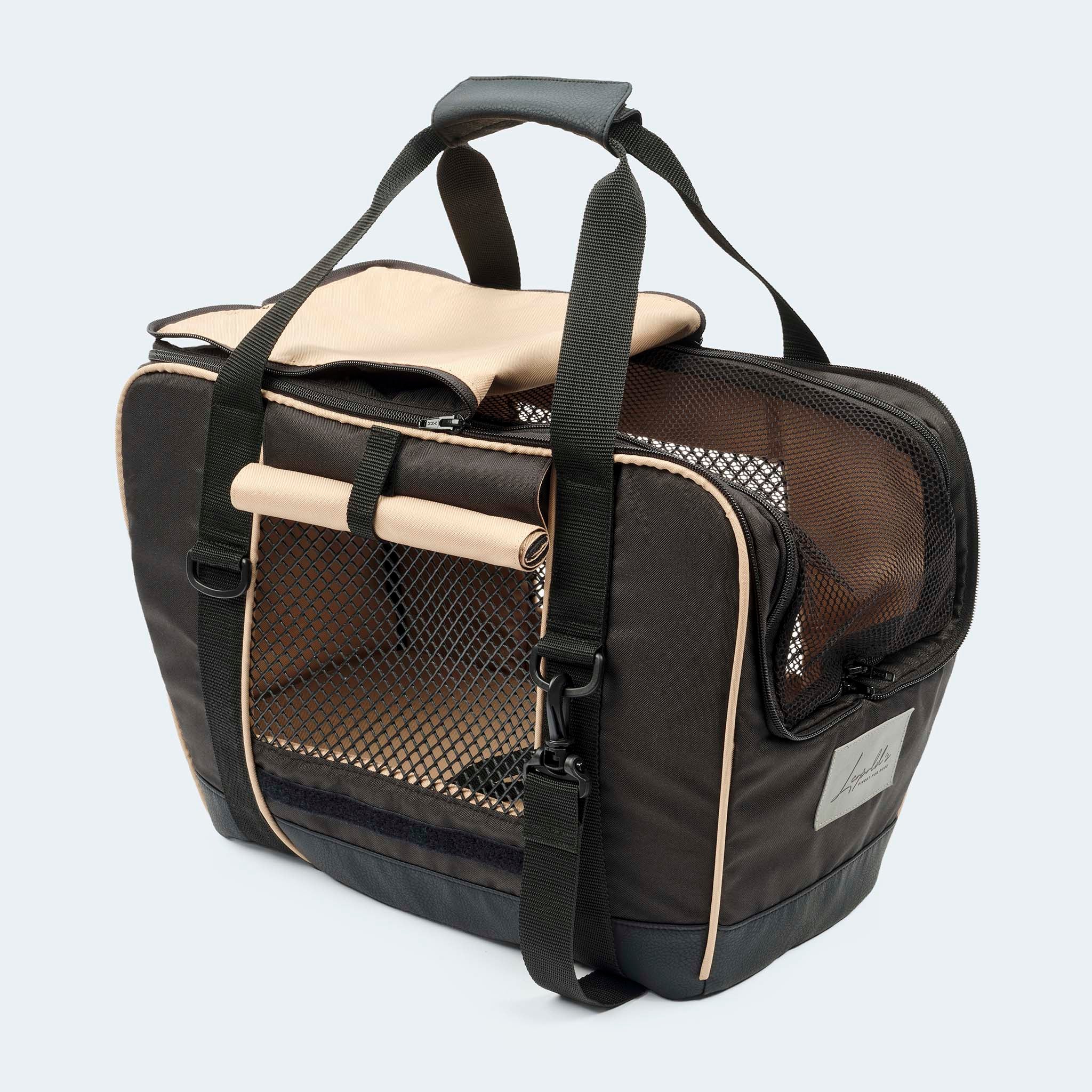 Fahrradtasche für Hunde in schwarz Sonnenschutz halb geschlossen.