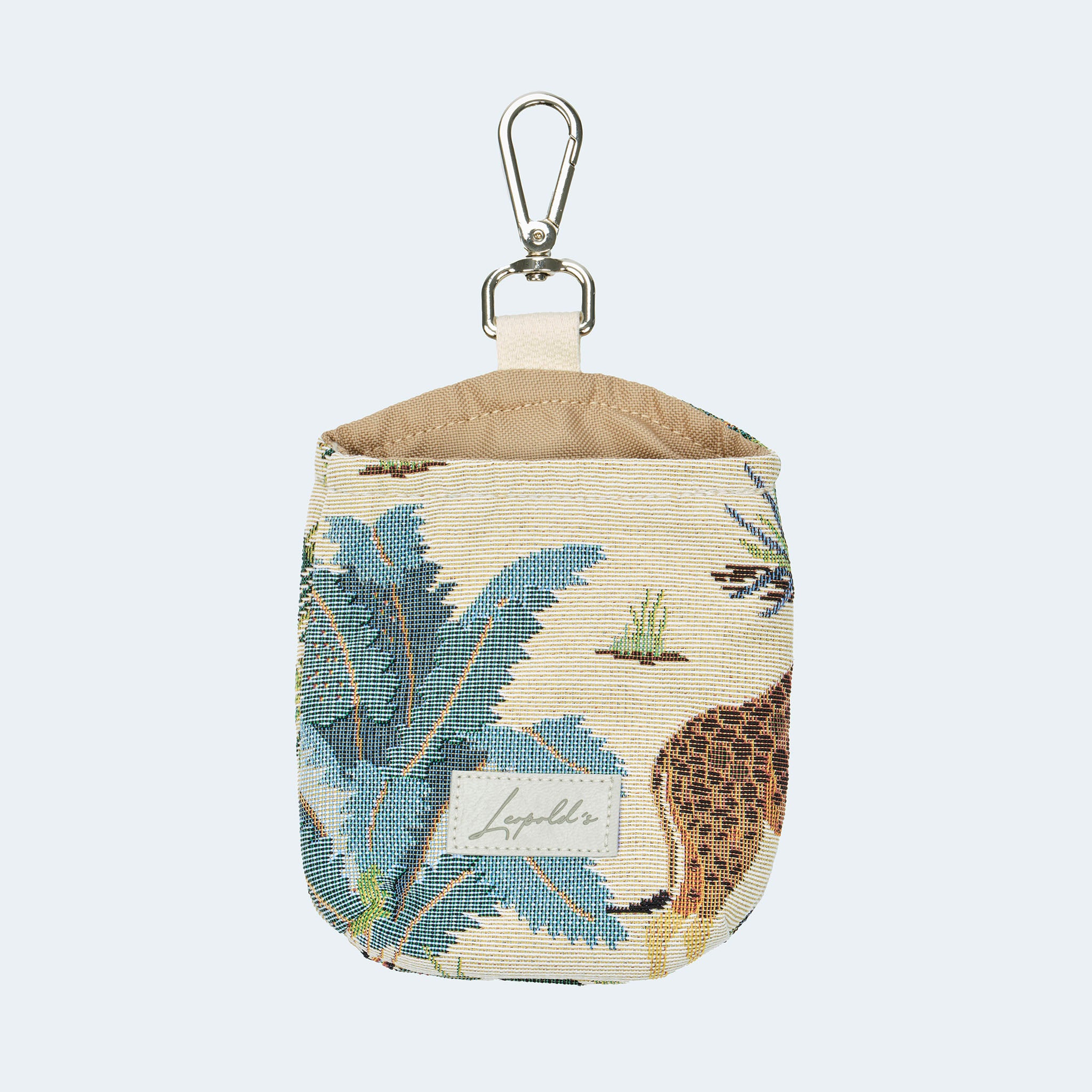 Leopold's Finest | Vorderseite des Leckerlibeutels für Hunde im stylischen Dschungelmuster Kapstadt.