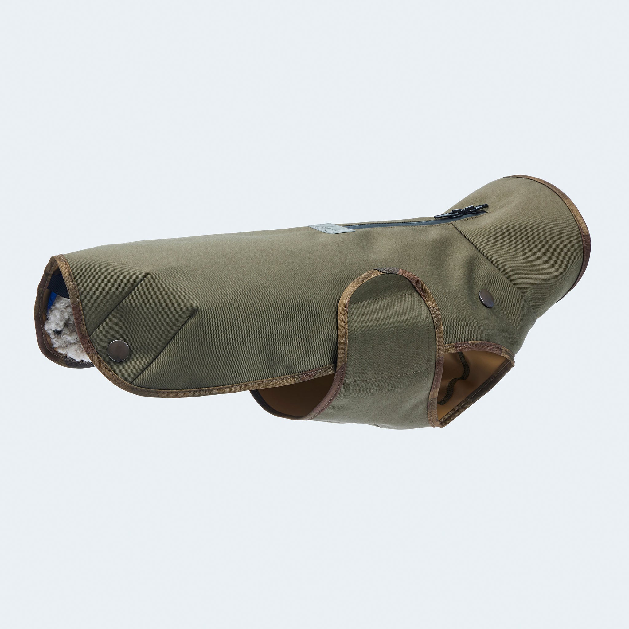 Leopold's Finest | Gefütterter
Hundewintermantel im Parka Stil in oliv für Dackel und kleine Hunde. Seitenansicht